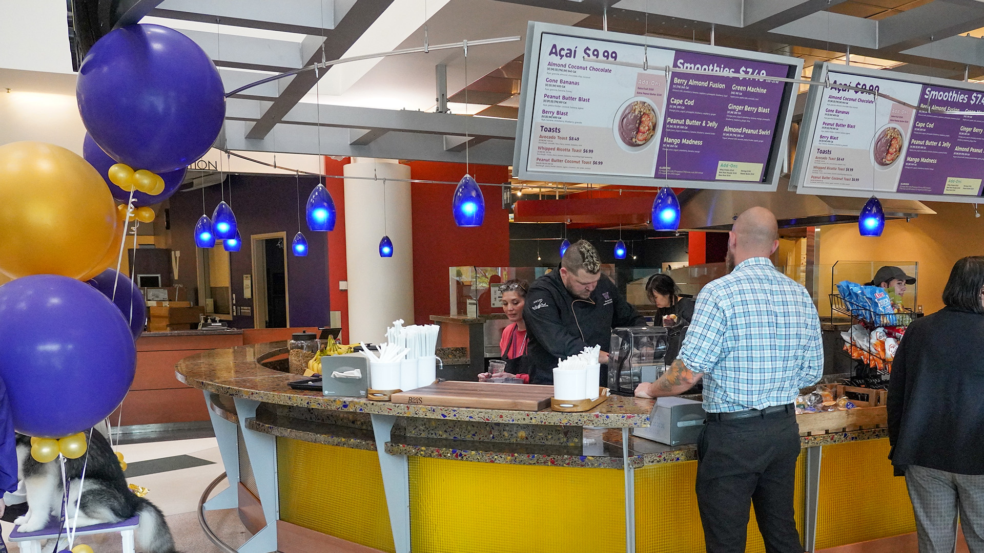 Customers enjoying smoothies at Dawg Bites in the UW IMA 