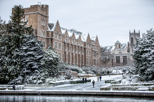 Students walking on campus covered in snow