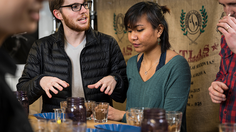 Participants in a Husky Grind Pop-up at a campus location