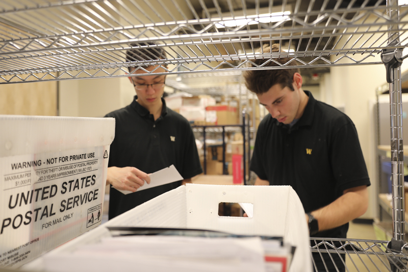 Resident Guide Students in Mail Room