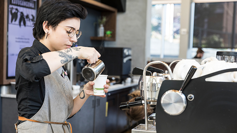 Husky Grind Barista preparing for cupping session